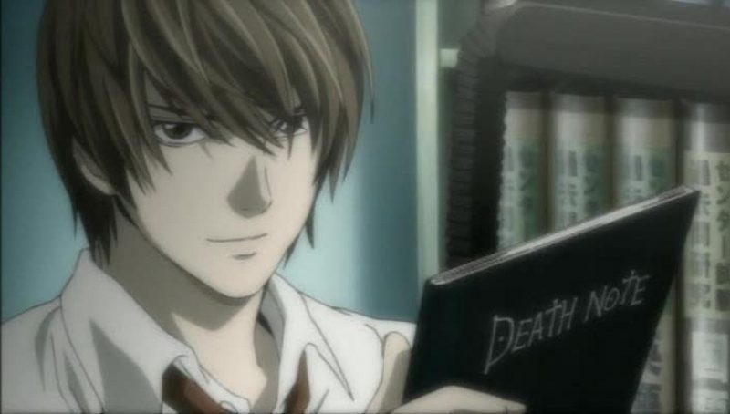 Light Yagami with the Death Note in his hands