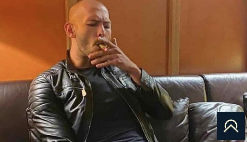 Andrew tate smoking a cigar